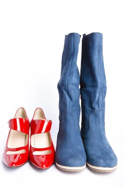 Boty a červené boty — Stock fotografie