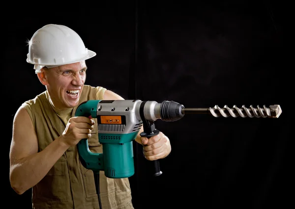El constructor en un casco protector — Foto de Stock