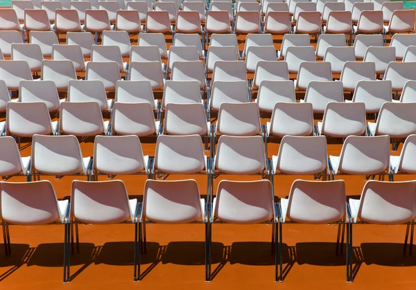 File vuote di sedili schienali allo spettatore — Foto Stock