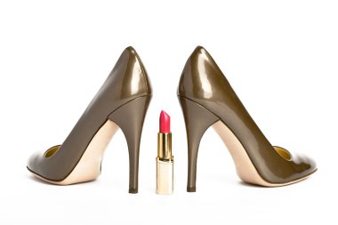 Shoes on a high heel and lipstick clipart