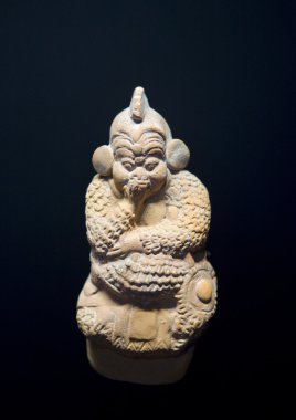 Figurine of one of ancient indian gods clipart