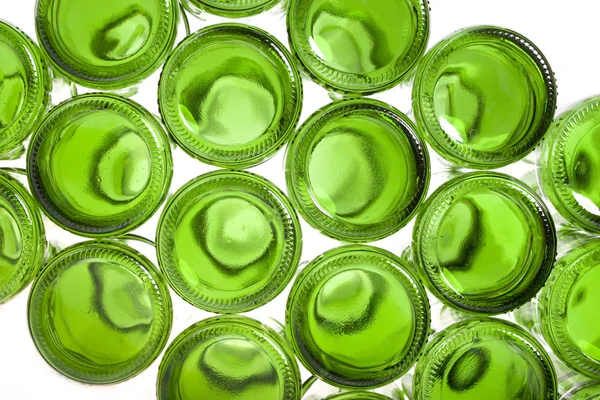 stock image Bottoms of empty glass bottles