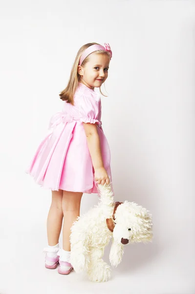 Menina agradável em rosa — Fotografia de Stock