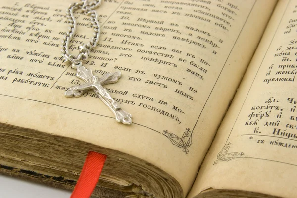 stock image Old bible and silver cross