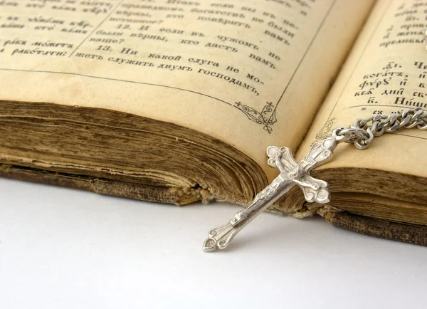 stock image Old bible and silver cross