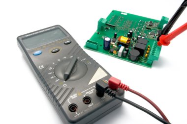 Multimeter and printer circuit board clipart