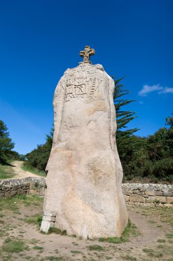 Christianized menhir in Brittany, France clipart