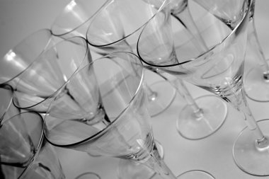 Glass cups aranged ready for a party clipart