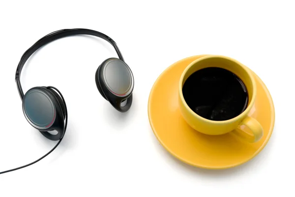 Isolated cup of coffee with headphones — Stock Photo, Image