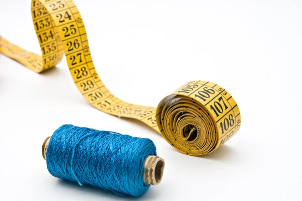 Nastro di misura e bobina filo blu — Foto Stock