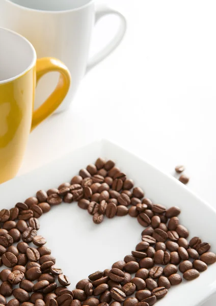 Serce składa się z ziaren kawy — Zdjęcie stockowe