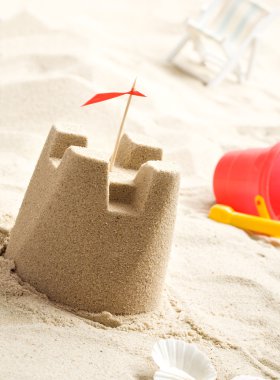Sand castle on the beach clipart