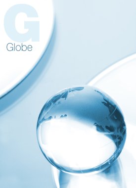 Globe made of glass in blue ambient ligh clipart
