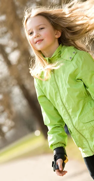 Young girl on rollerblades — Stock Photo, Image