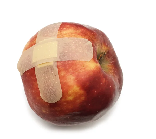 Apple with bandaid — Stock Photo, Image