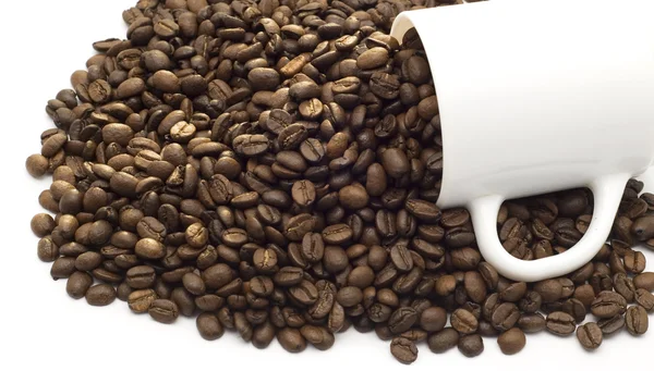 Granos de café y taza de café — Foto de Stock