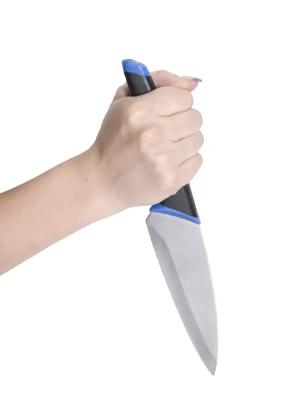 Нож в женской руке — стоковое фото