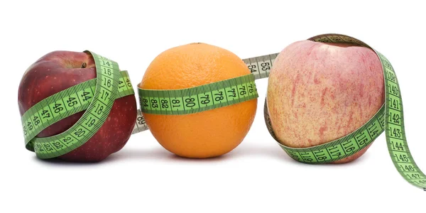 Measure tape and fruits — Stock Photo, Image