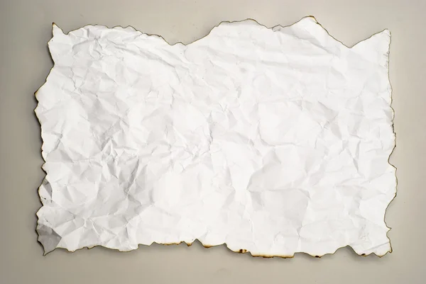 Морщинистой сожгли бумага — стоковое фото