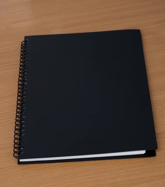 Spirála notebook na stůl — Stock fotografie