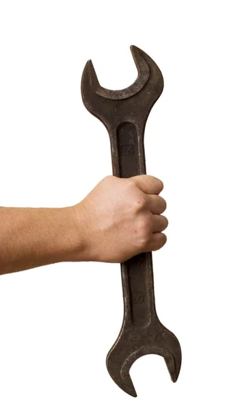Wrench in a hand — Stock Photo, Image