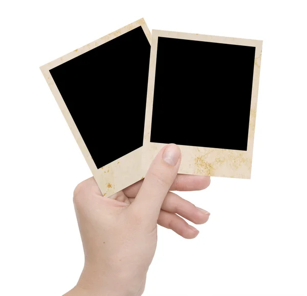Twee fotoframes in een hand — Stockfoto