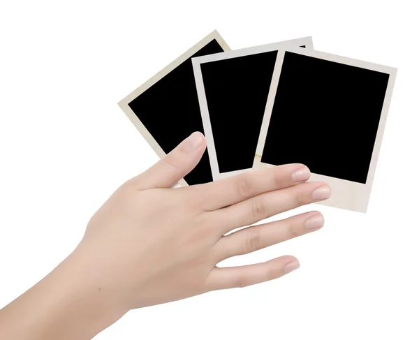 Stock image Three photo frames in a hand