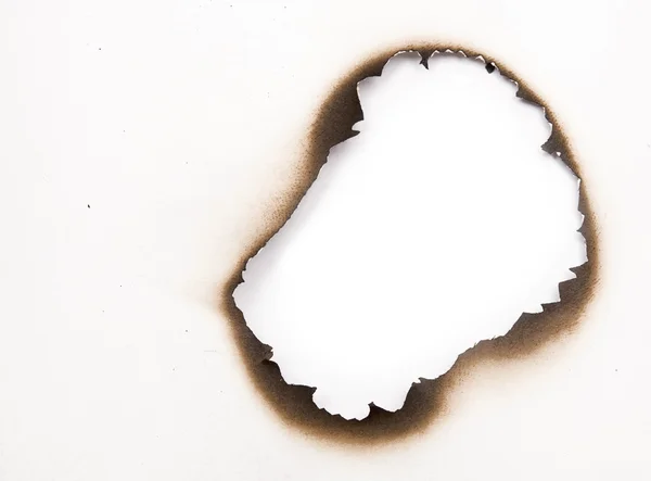 Buraco queimado — Fotografia de Stock