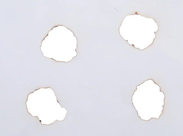 Burnt holes — Stock Photo, Image
