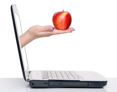 Hand with apple and laptop clipart