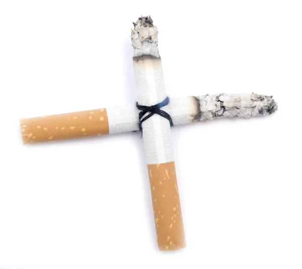 Сигаретный крест — стоковое фото