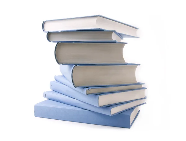 Голубые книги на белом фоне — стоковое фото