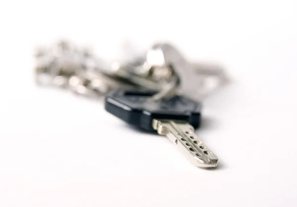 stock image A bunch of keys isolated against a clea