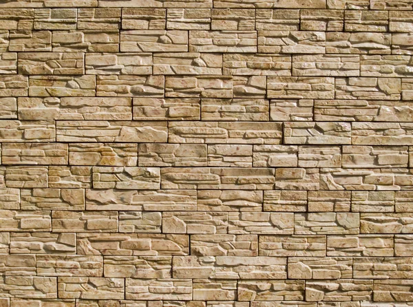 Стена из декоративных камней — стоковое фото