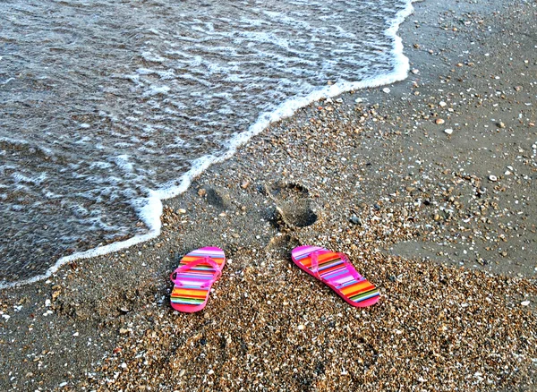 Flip-flop on sea beach — Stock Photo, Image