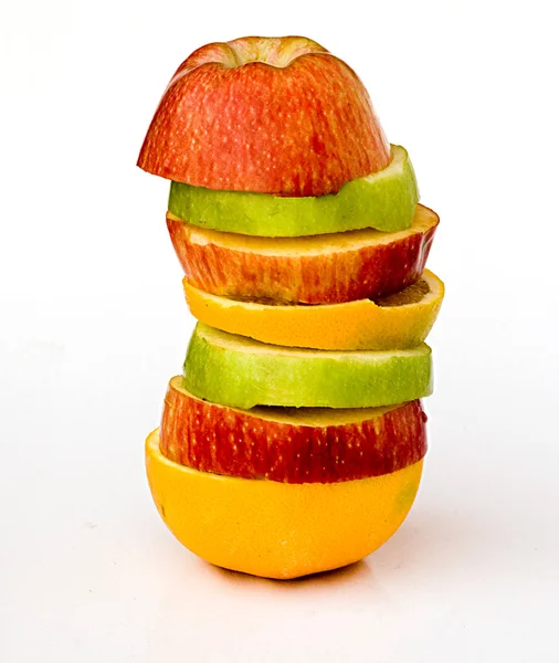 Kousky jablka a pomeranče — Stock fotografie