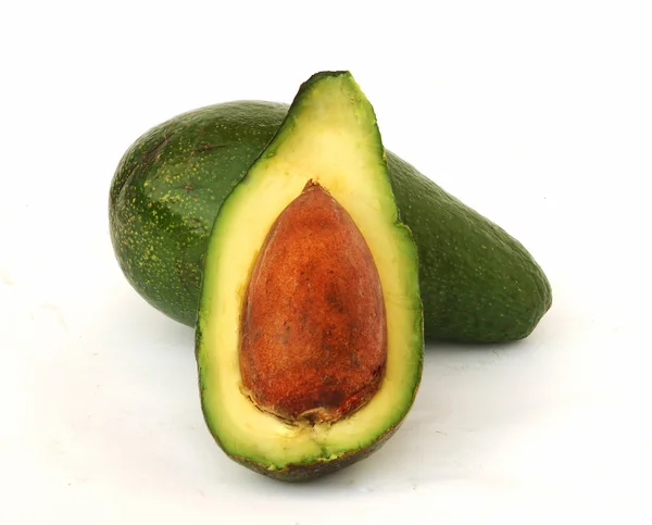 Avocado and its section — Stock Photo, Image