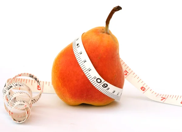 A pear with measuring tape — Stock Photo, Image