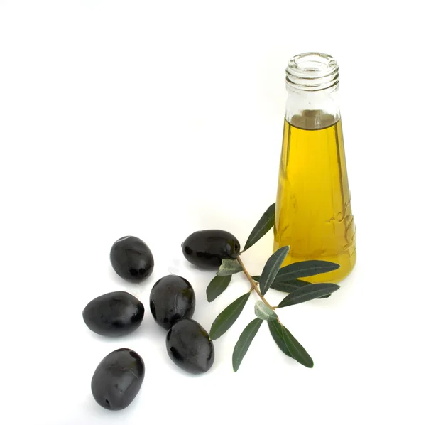Fles olijfolie en olive branch — Stockfoto
