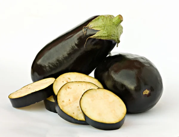 Eggplant and slices — Stock Photo, Image