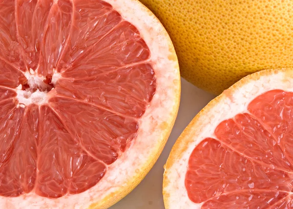 Close up van secties van grapefruit — Stockfoto