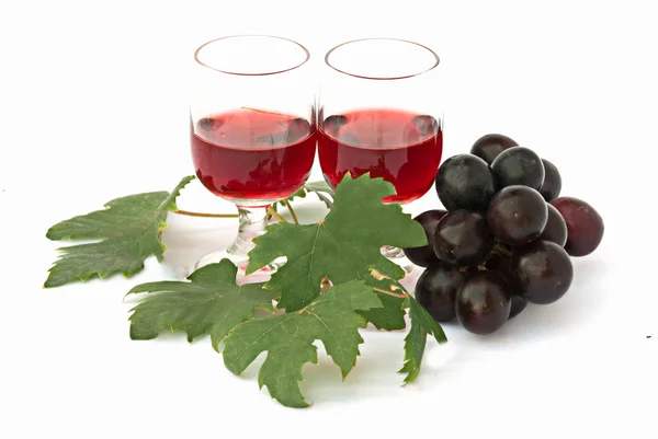 Par de taças e uvas — Fotografia de Stock