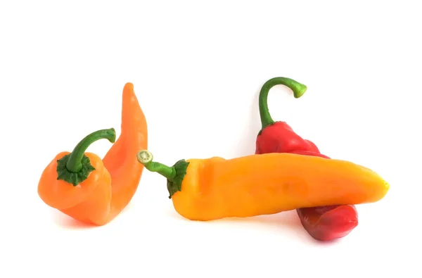Three peppers on white background — Stock Photo, Image