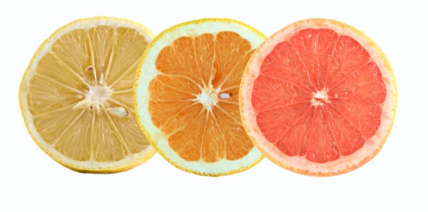 Plakjes citroen-, sinaasappel- en grapefruitsap — Stockfoto