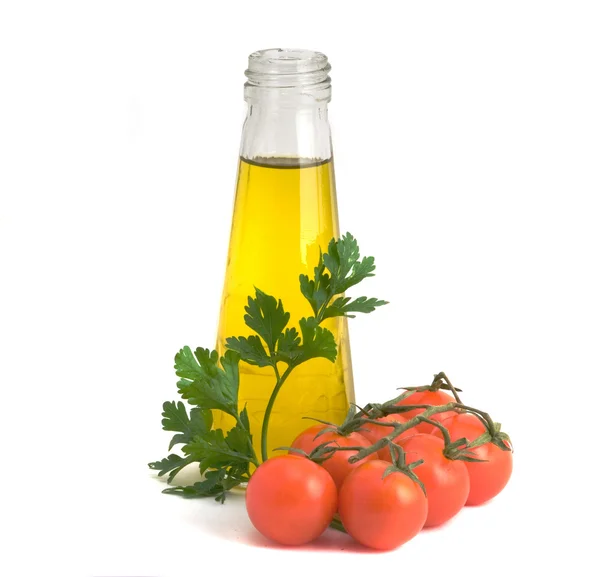 Bottle of olive oil, tomatoes — Stock Photo, Image