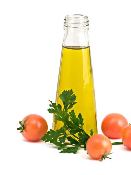 Bottle of olive oil, tomatoes — Stock Photo, Image