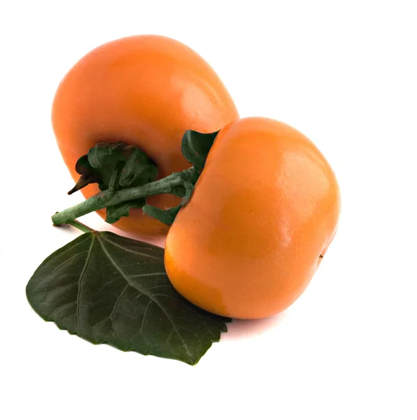 Two persimmons on white background — Stock Photo, Image