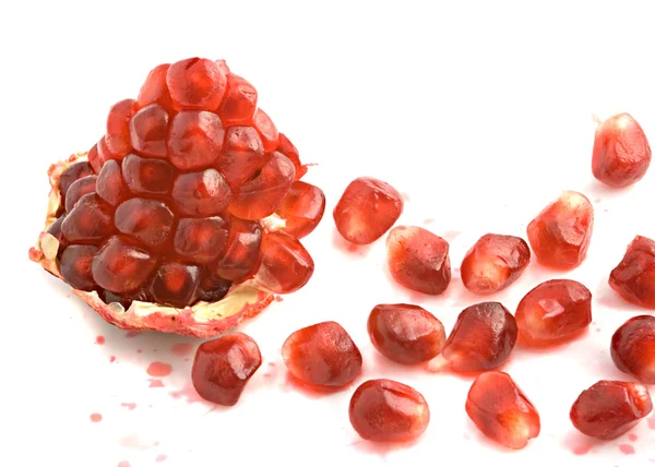 Open pomegranate and arils — Stock Photo, Image