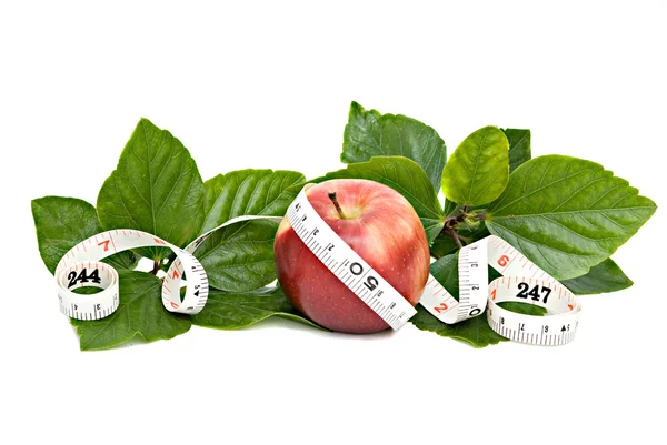 Jablko s měřicí páska — Stock fotografie