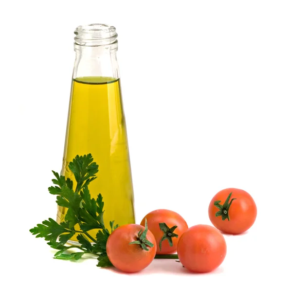 Bottle of olive oil, tomatoes, and parsl — Stock Photo, Image